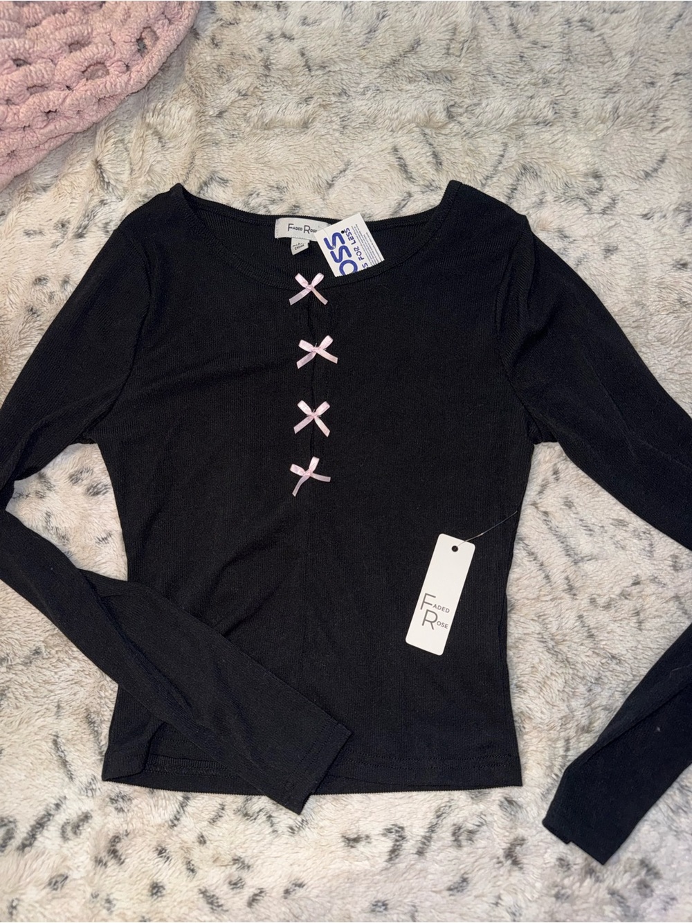 BRAND NEW black long sleeve with bow and cut out chest design